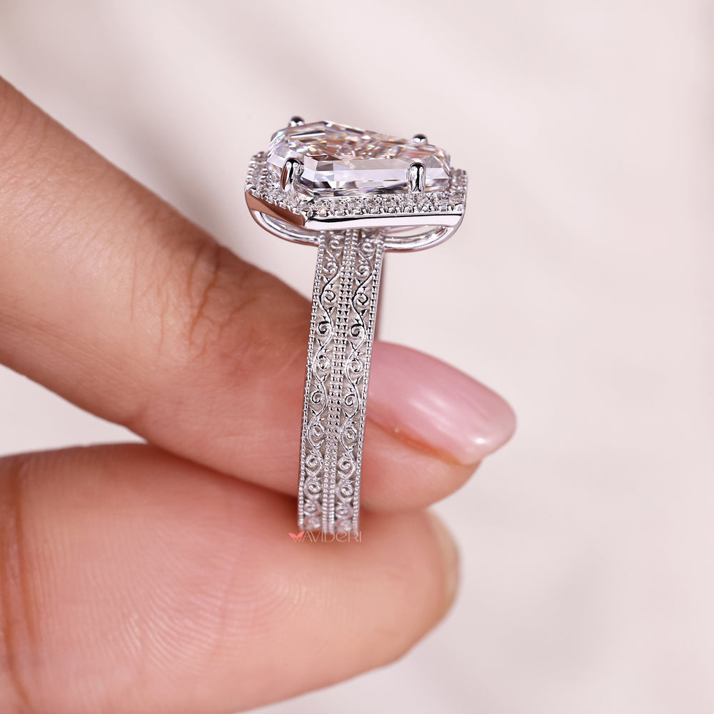 Milgrain setting ring with white gold engagement ring.