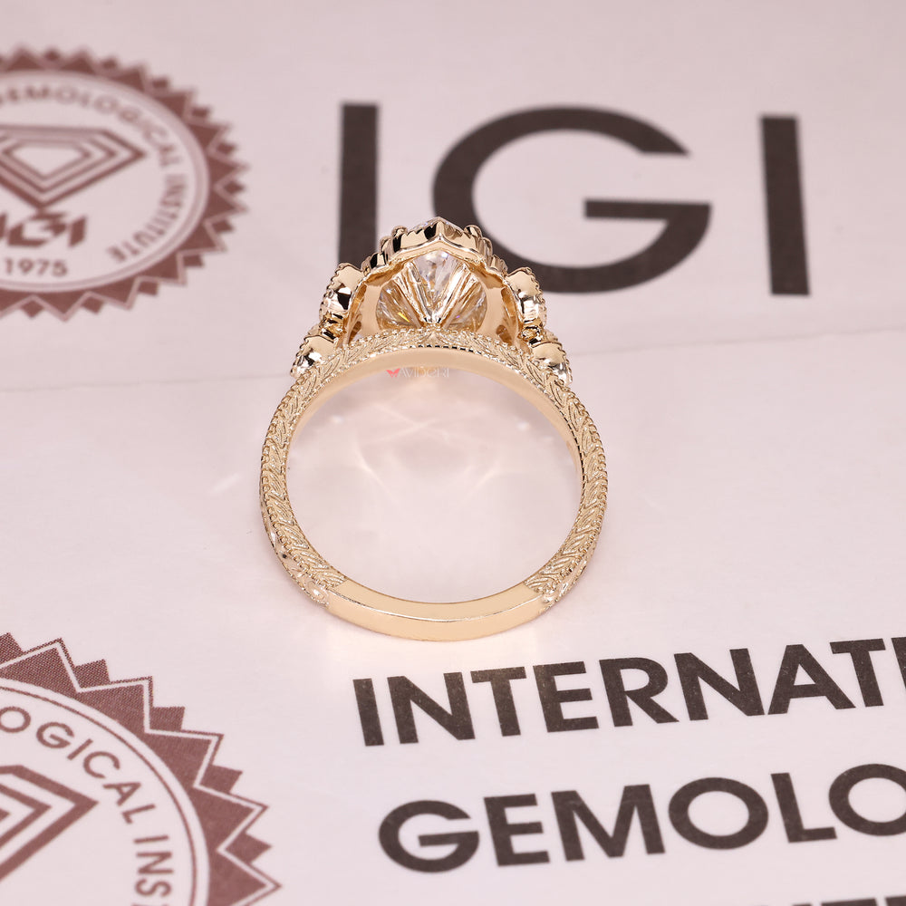 Handmade marquise diamond ring with vintage inspired detailing
