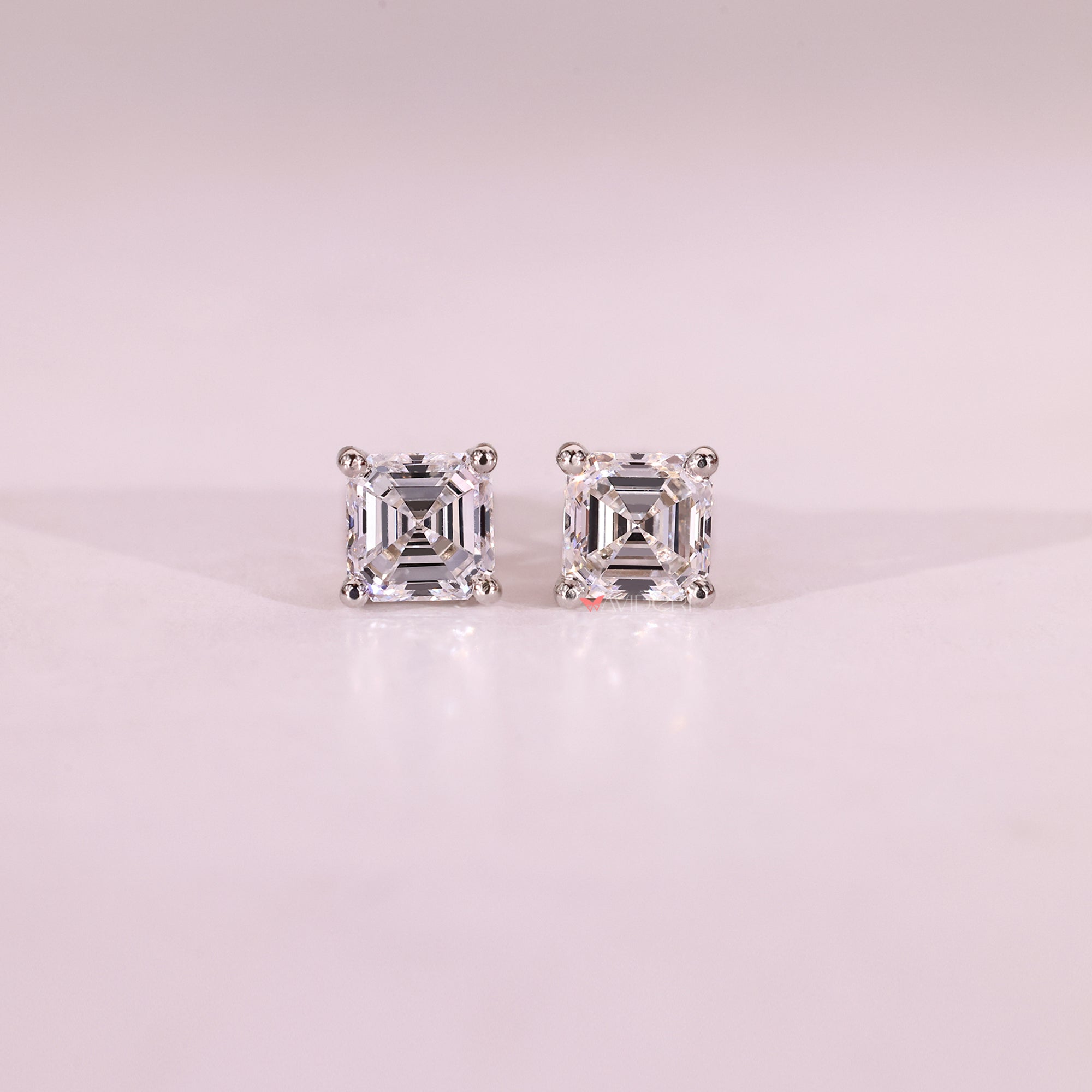 Four prong setting earrings designed for secure daily wear.