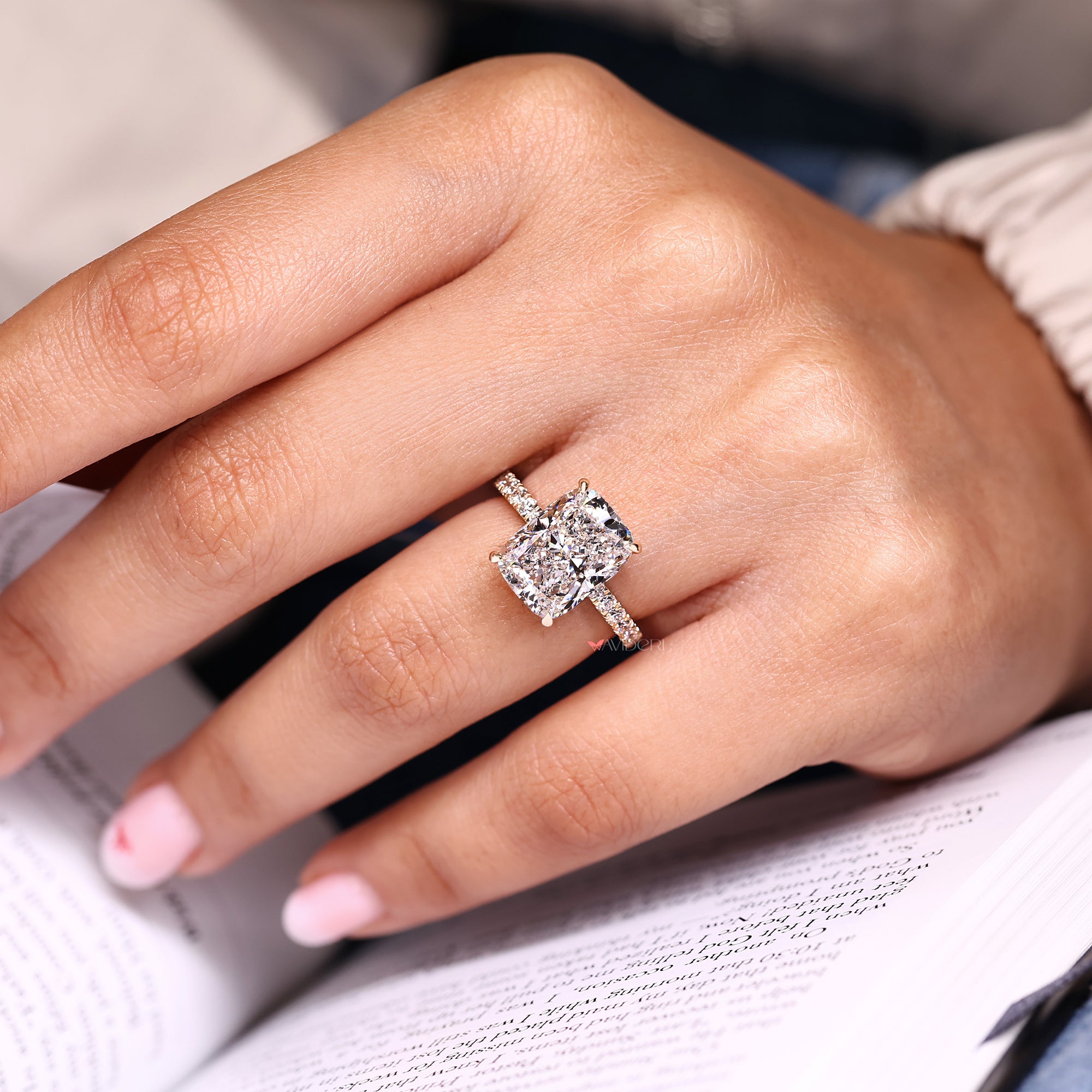 Cushion cut lab grown diamond ring with pave setting.
