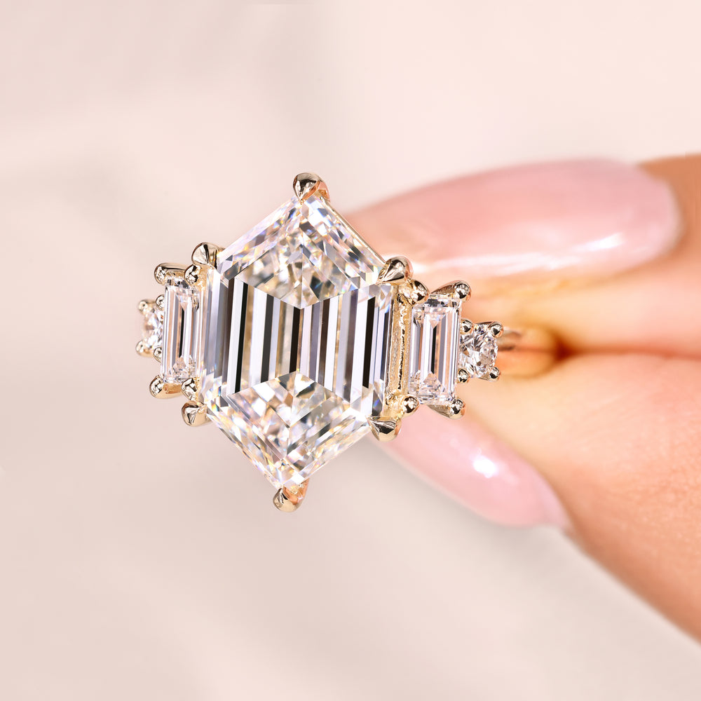 Hexagon ring with baguette and round stones.
