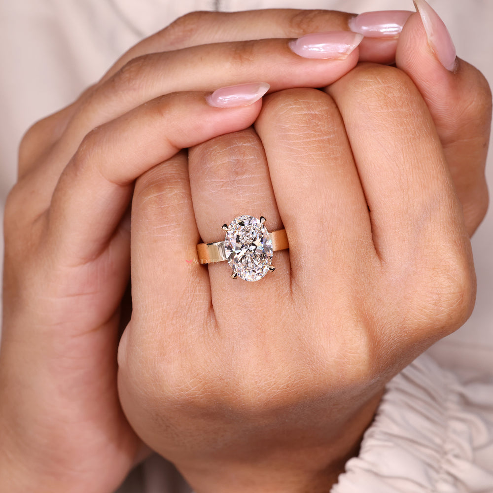 Double pave oval diamond ring hidden halo.
