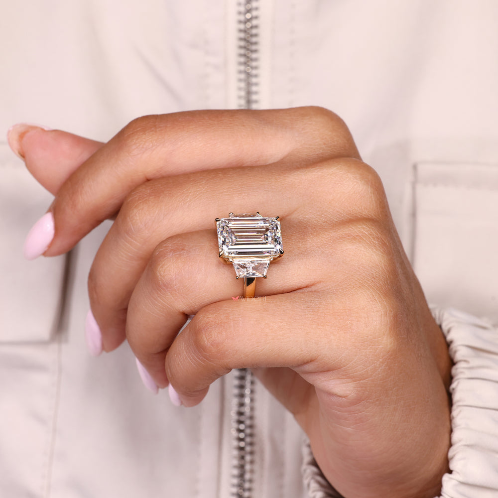 Handmade emerald cut ring with basket and claw setting
