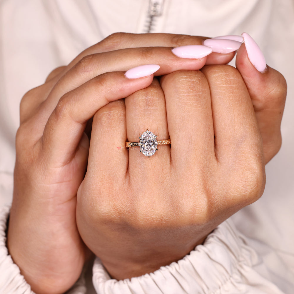 Handmade oval diamond ring with art deco style details
