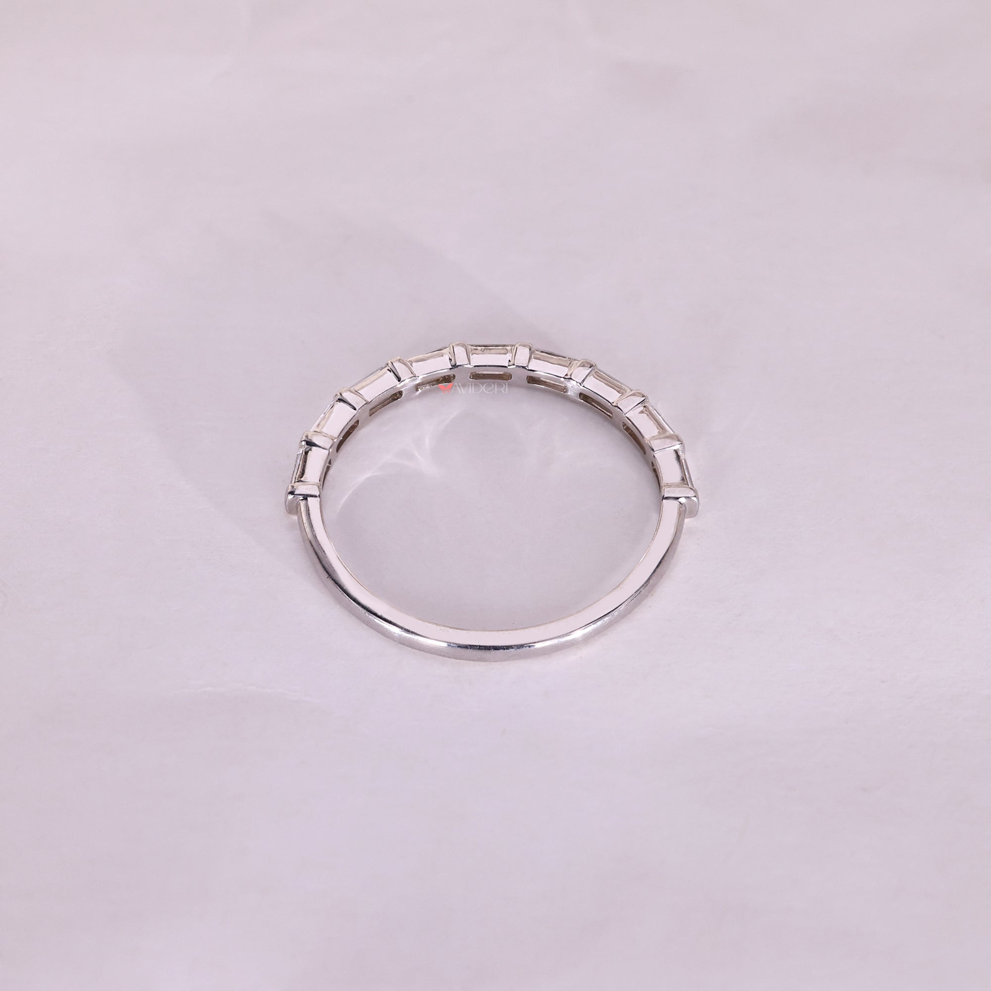 Handmade baguette diamond band bar setting.
