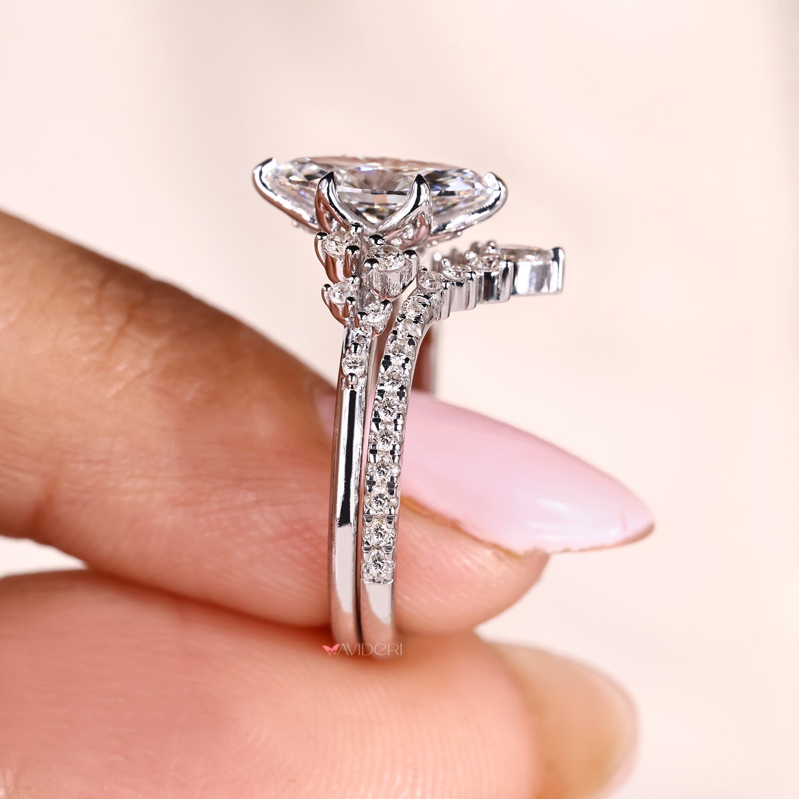 Marquise engagement ring with blue topaz hidden birthstone detail
