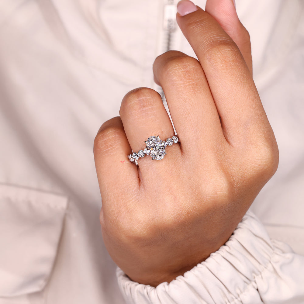 Handmade oval ring with four claw prong set.
