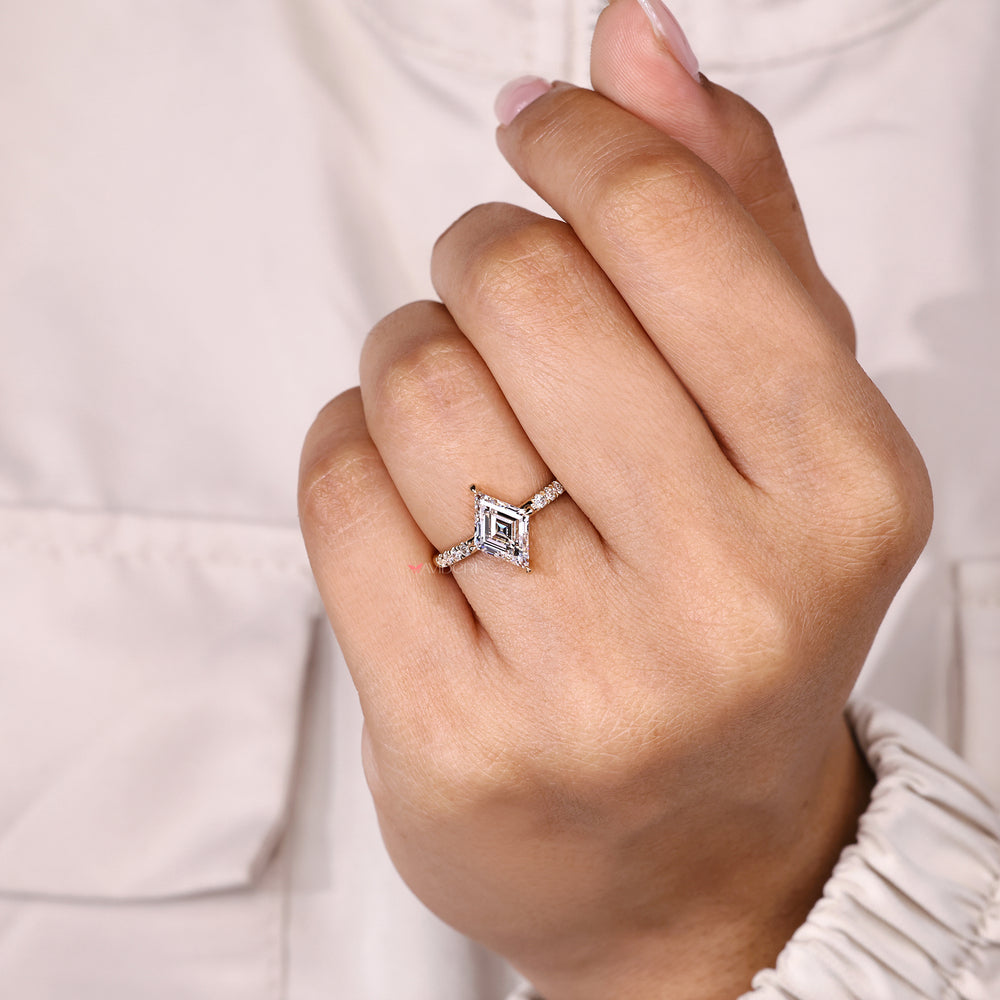 Claw prong lozenge diamond ring handmade style.
