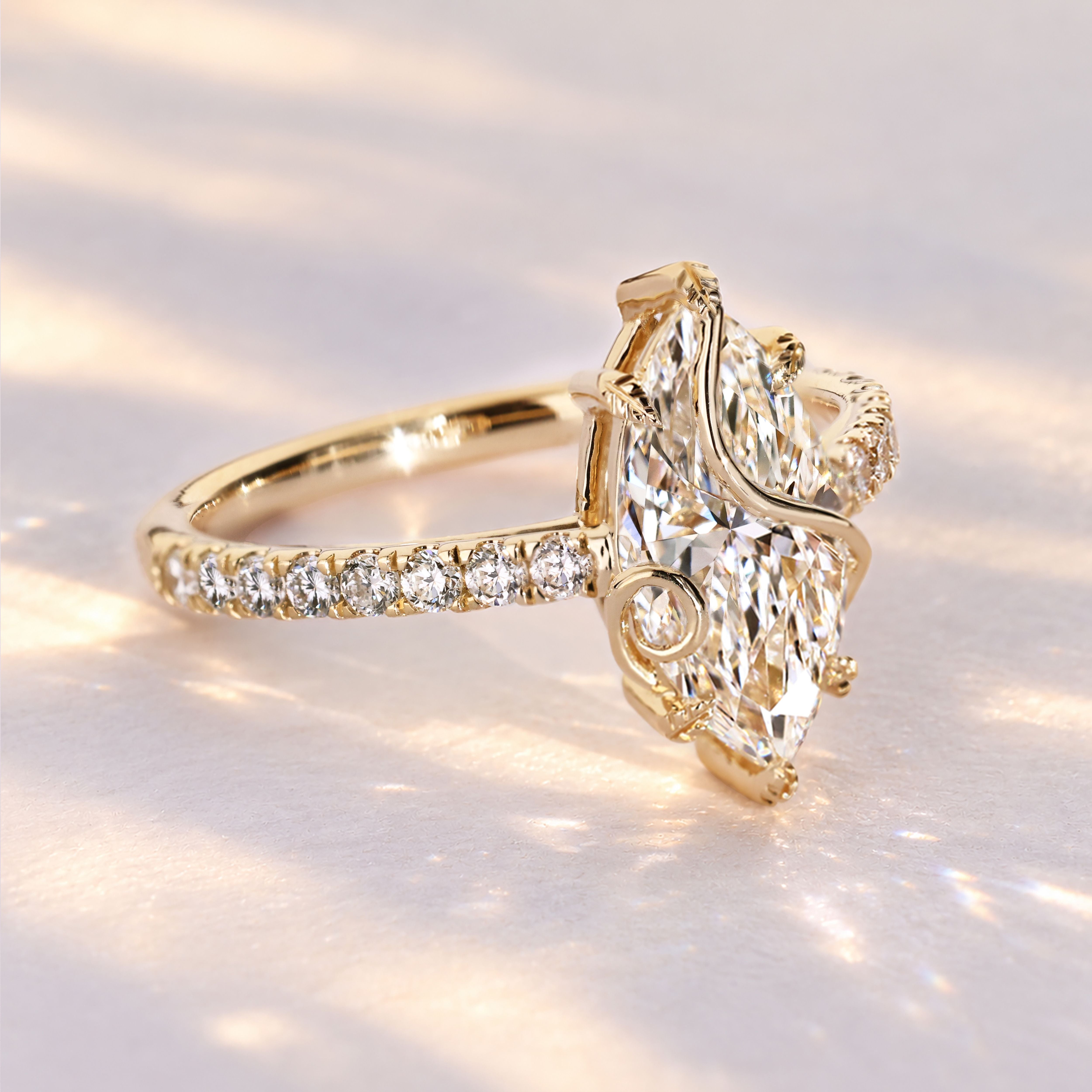 Marquise ring with nature inspired leaf prongs.
