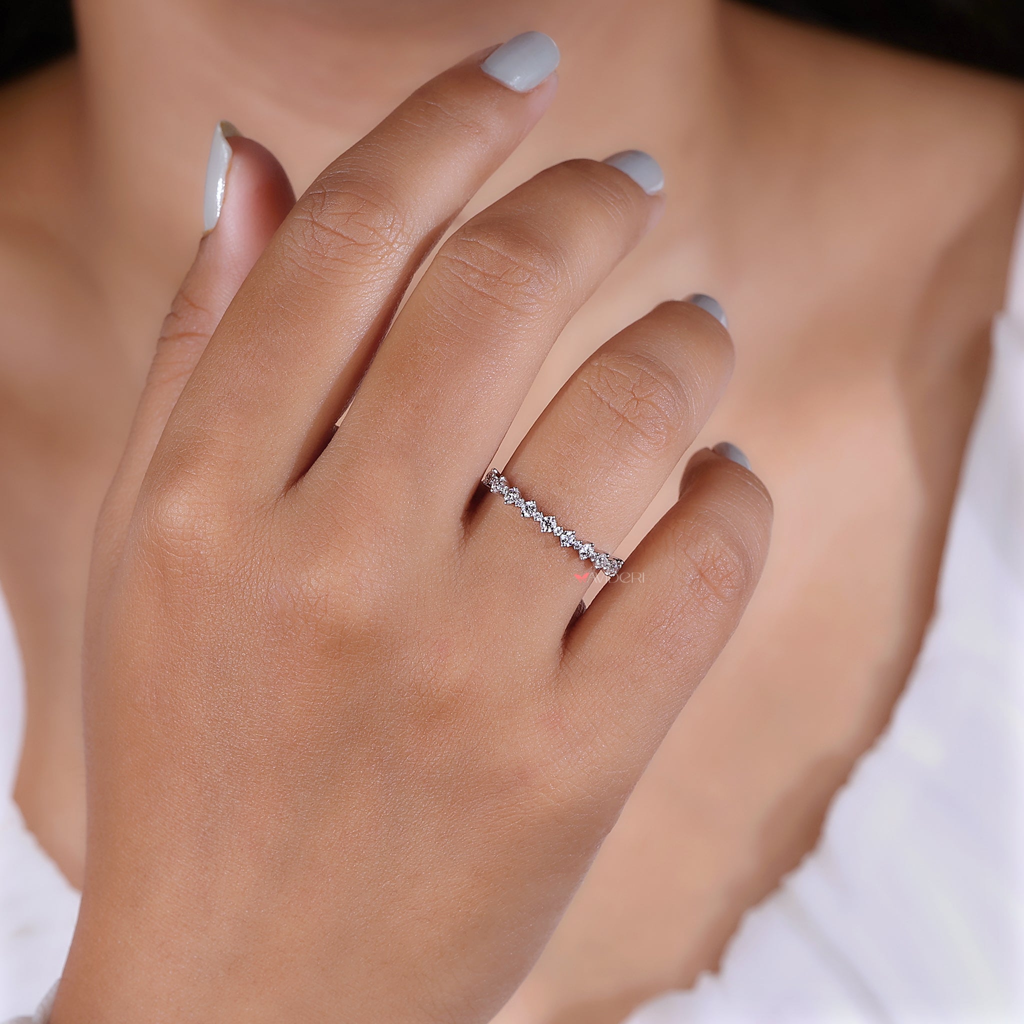 Elegant moissanite half eternity band ring.
