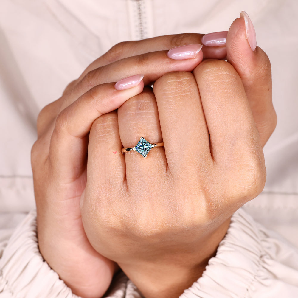 Handmade cyan blue moissanite ring solitaire.
