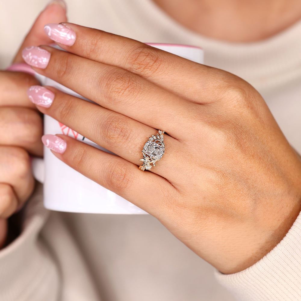 Cushion ring with signature butterfly style detail.
