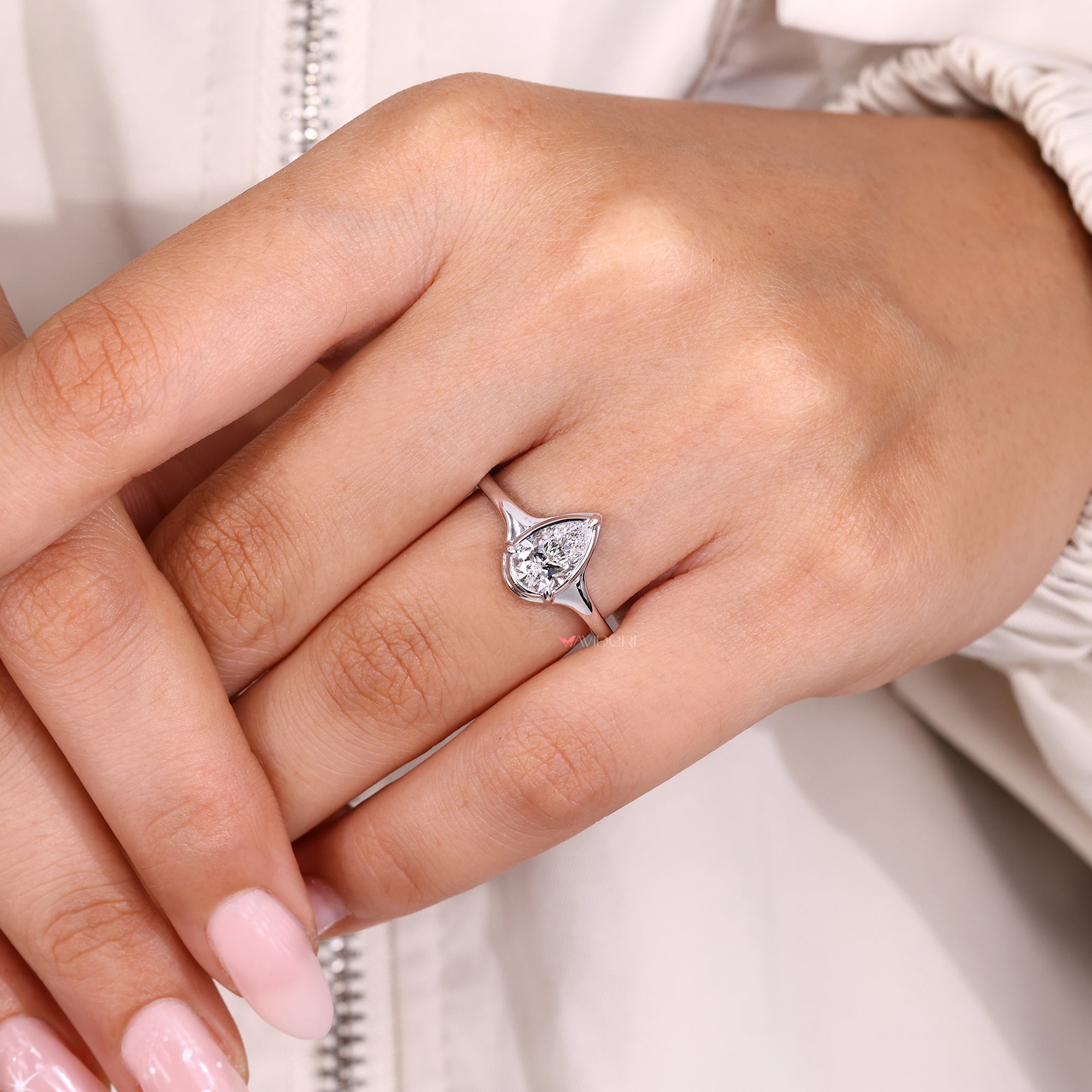 IGI certified diamond engagement ring in sleek tapered shank style.