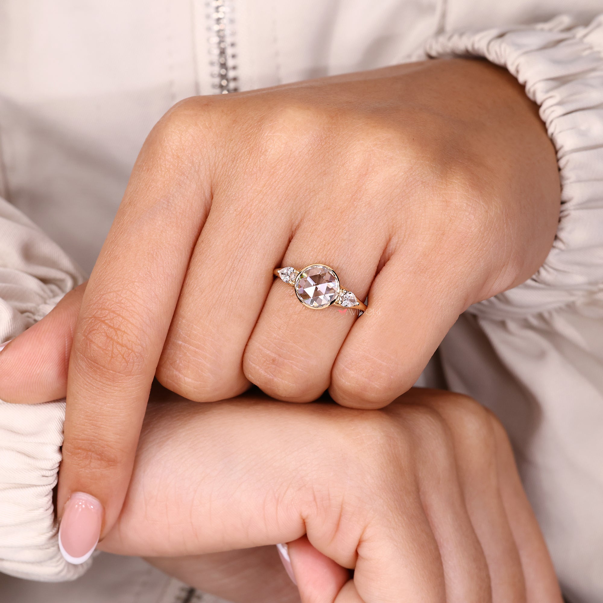Three stone bezel ring with 3 stone engagement ring.