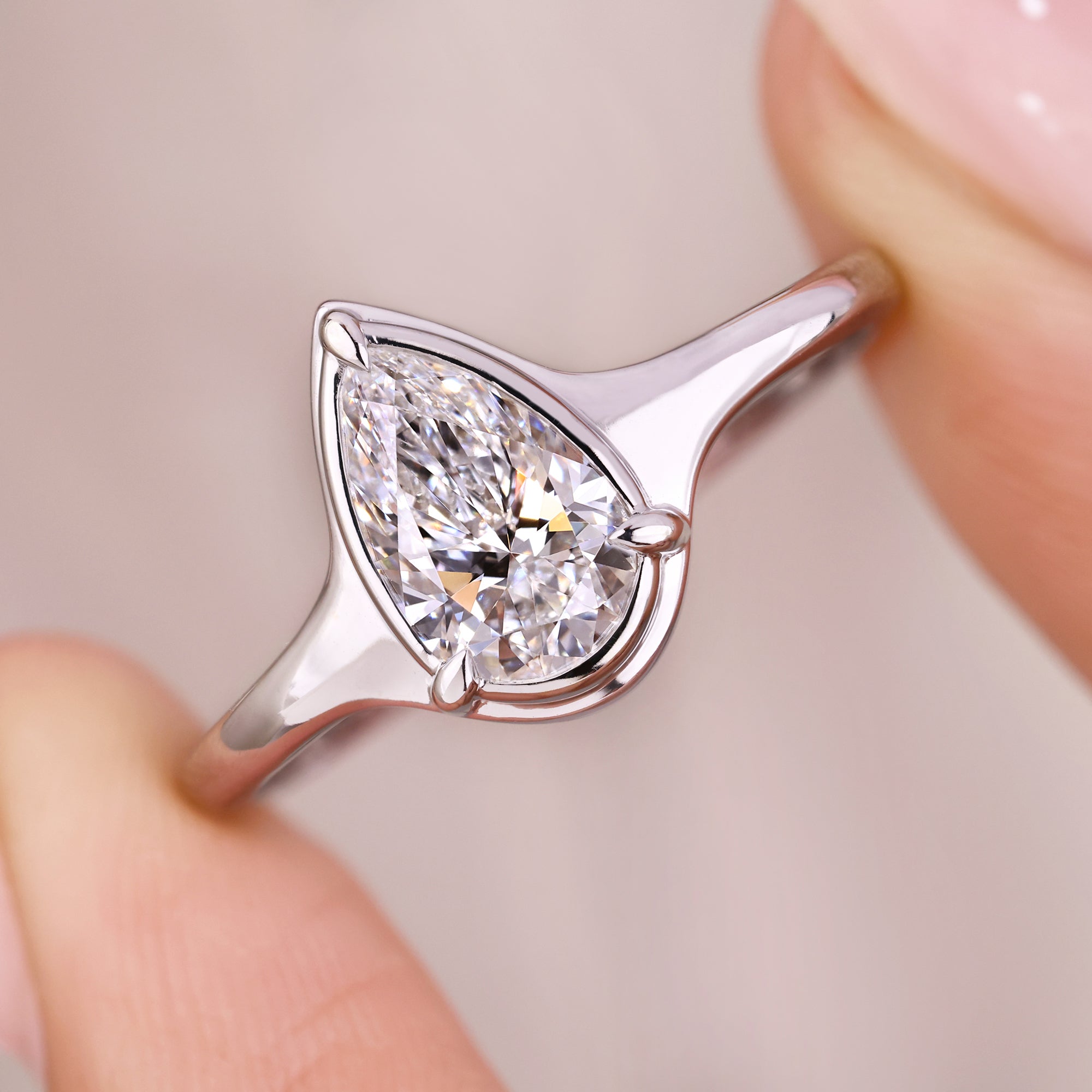 Buy engagement ring with three claw prong setting for lasting shine.