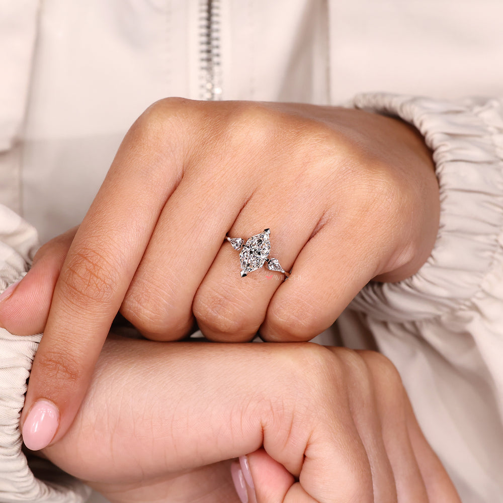 Custom engagement ring with Dutch marquise center and Lab Grown Diamond accents.