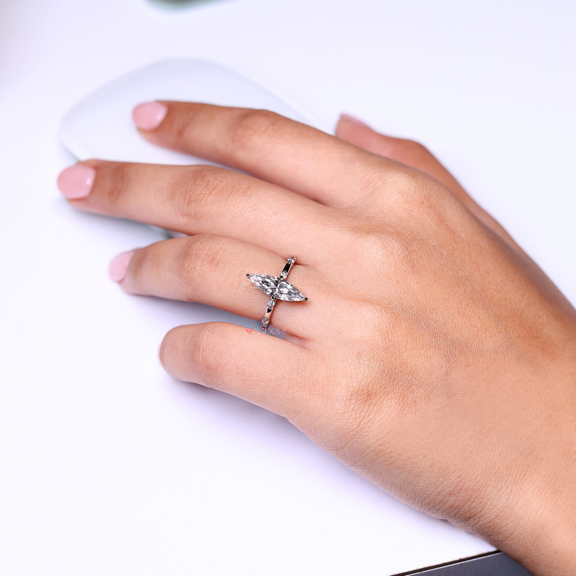 The compass prong setting adds a unique, secure hold to the stone, elevating its brilliance.
