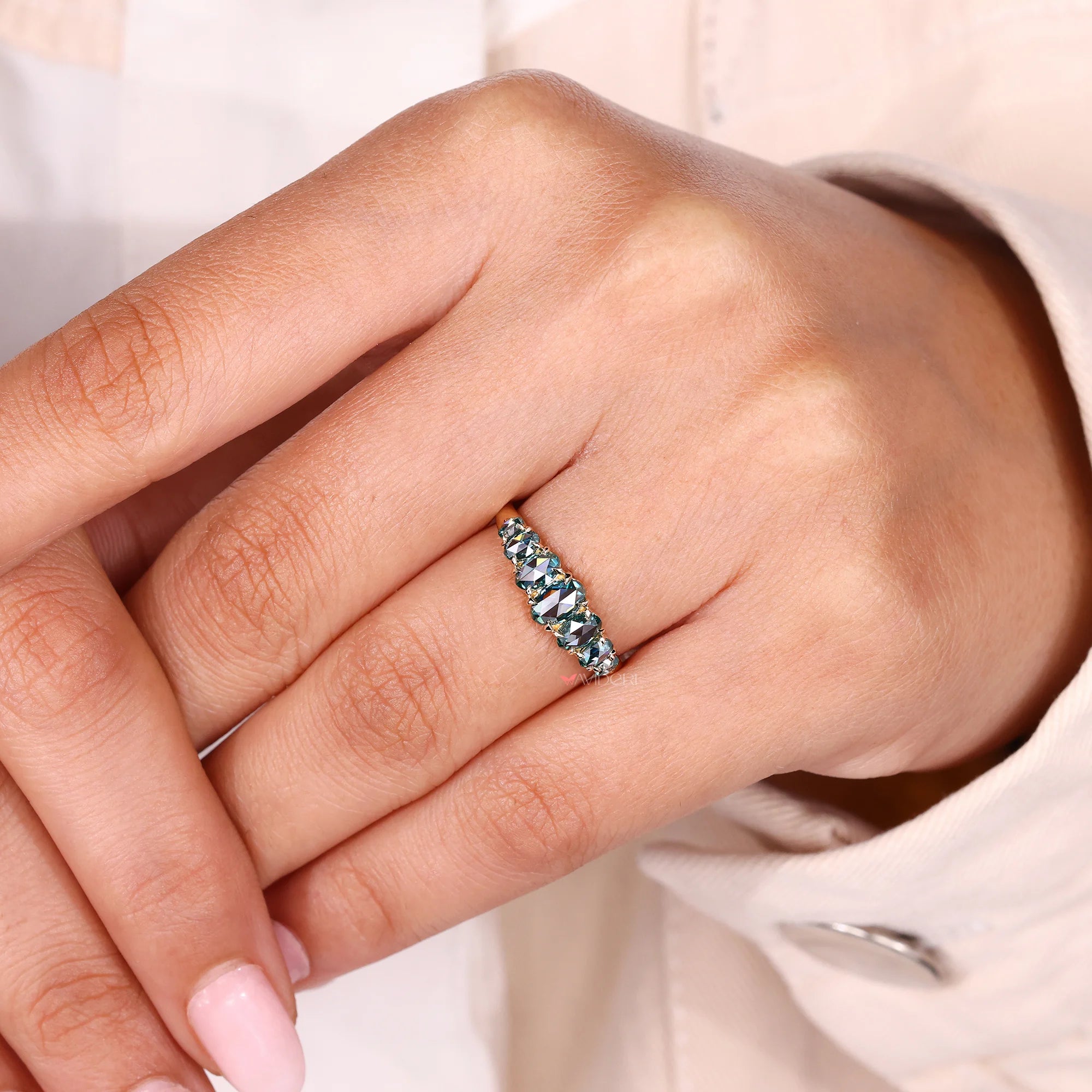 Seven stone band with tapered shank band.
