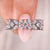 This marquise cut wedding band has a sleek, elegant design.