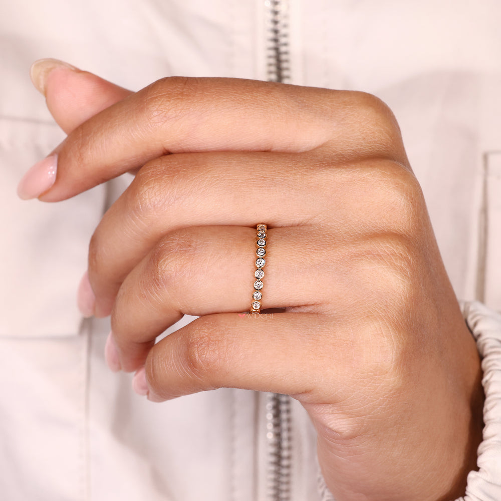 Handmade round diamond eternity wedding band.
