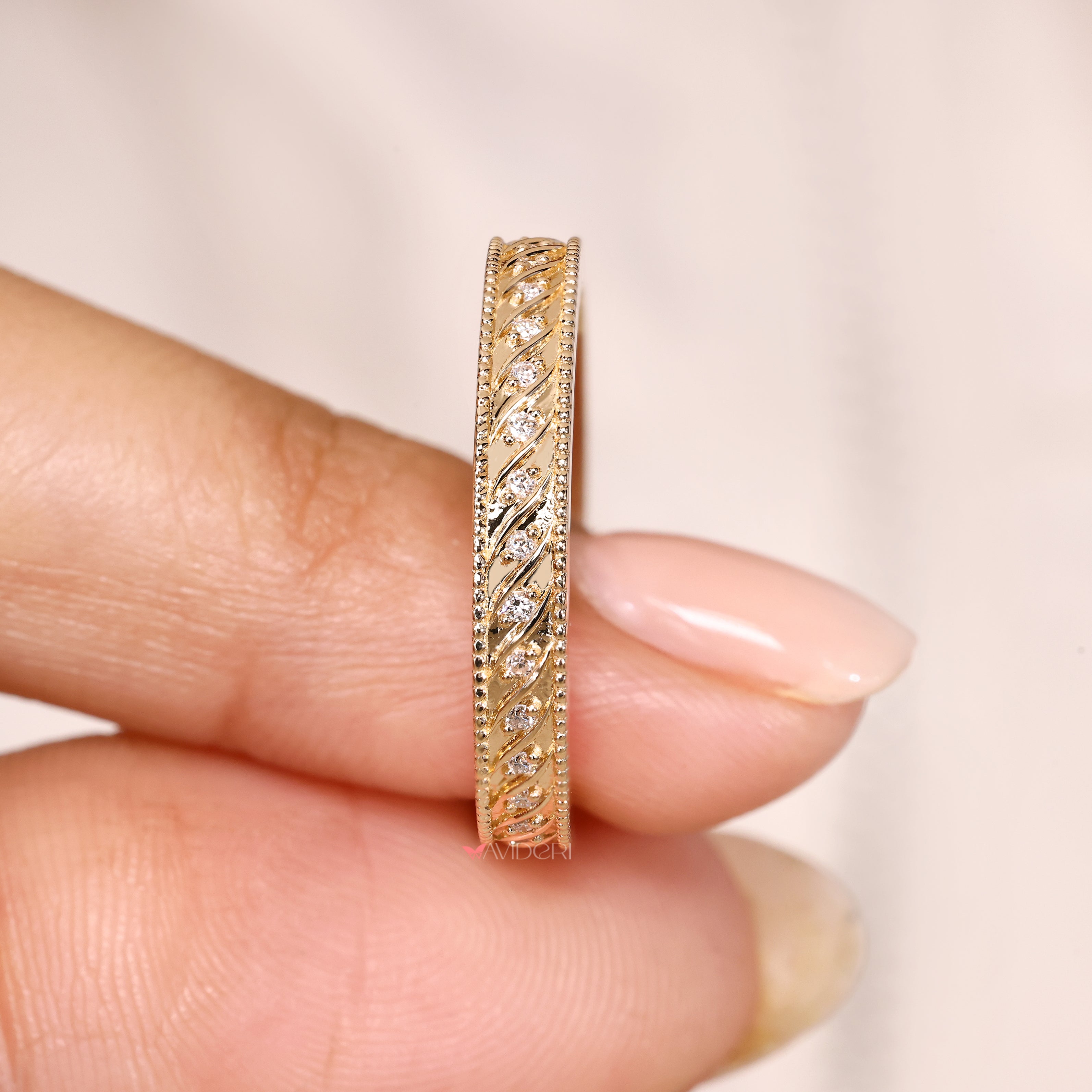 Vintage wedding band with round diamonds.
