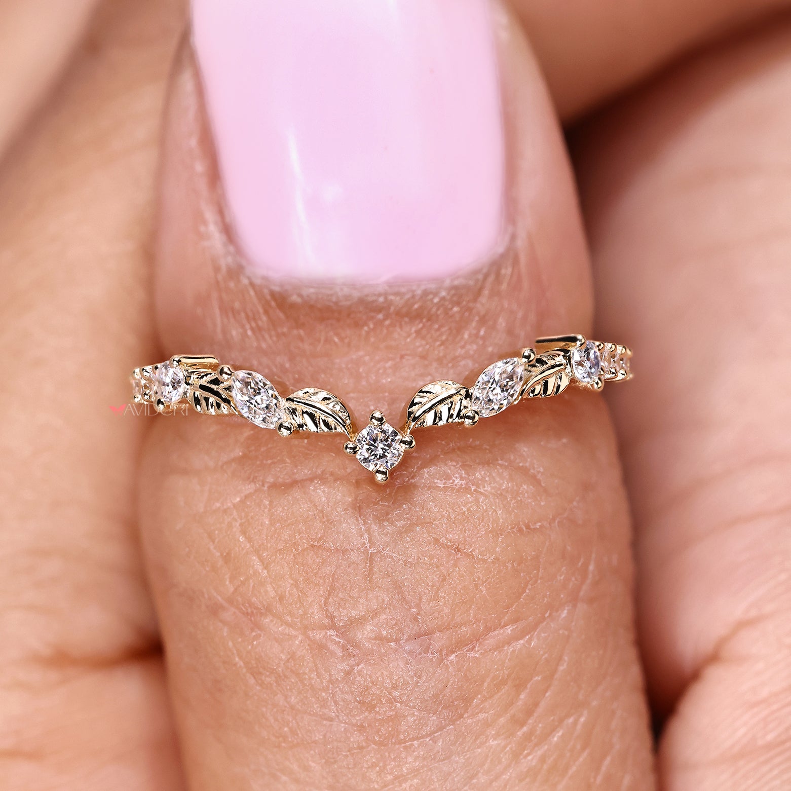 Semi eternity wedding band with marquise and round diamonds

