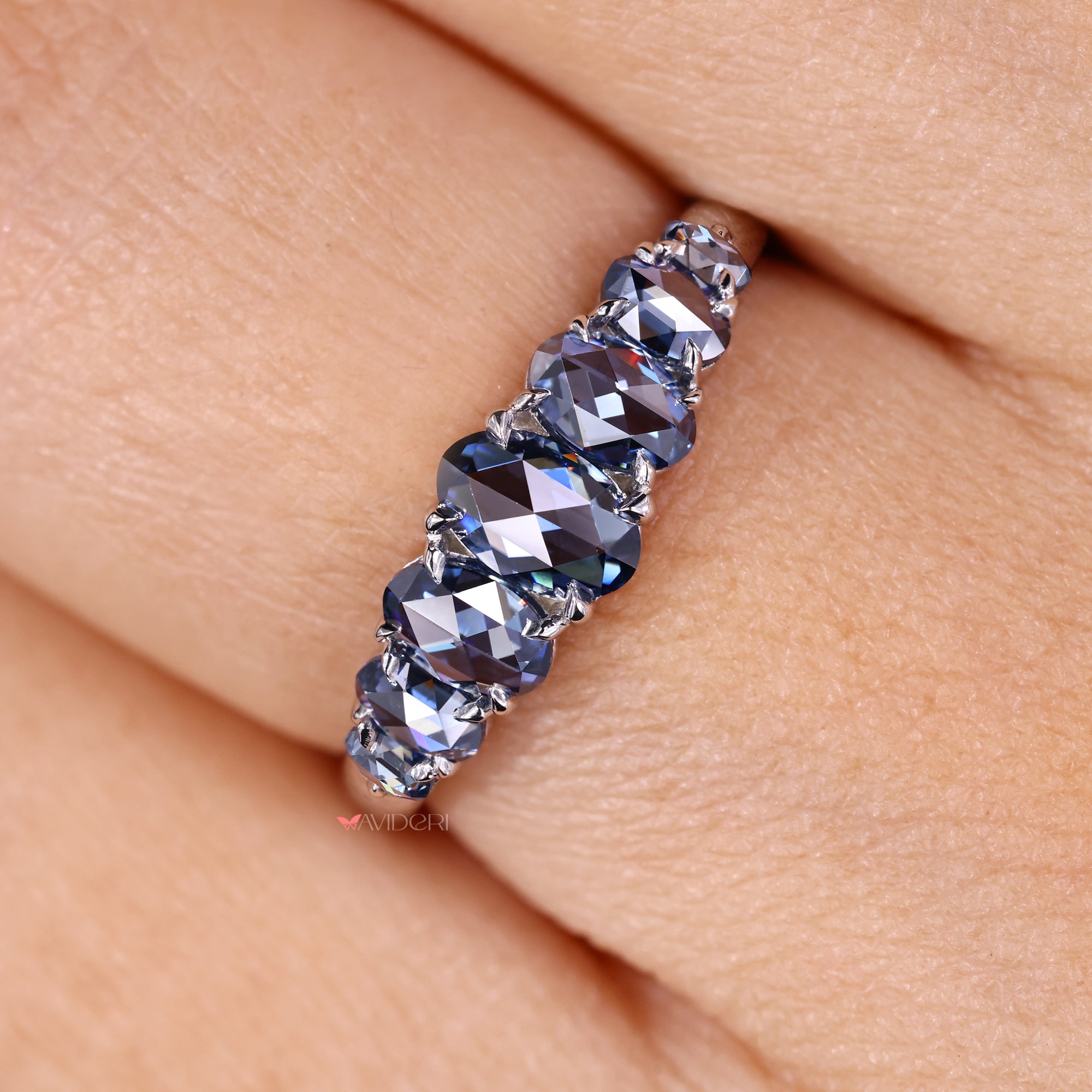 Seven stone band in avideri wedding band style.