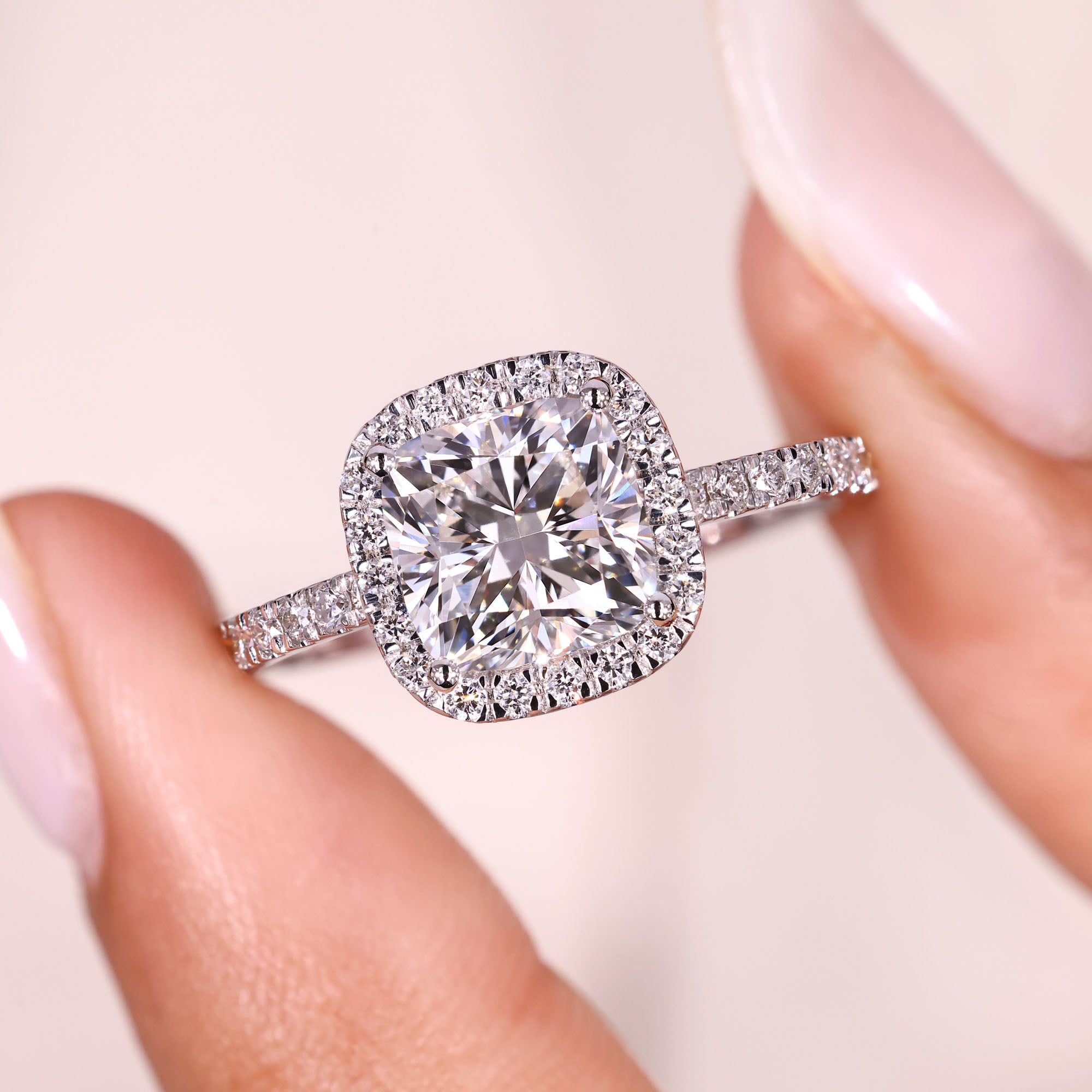 Cushion diamond ring with four prong setting.
