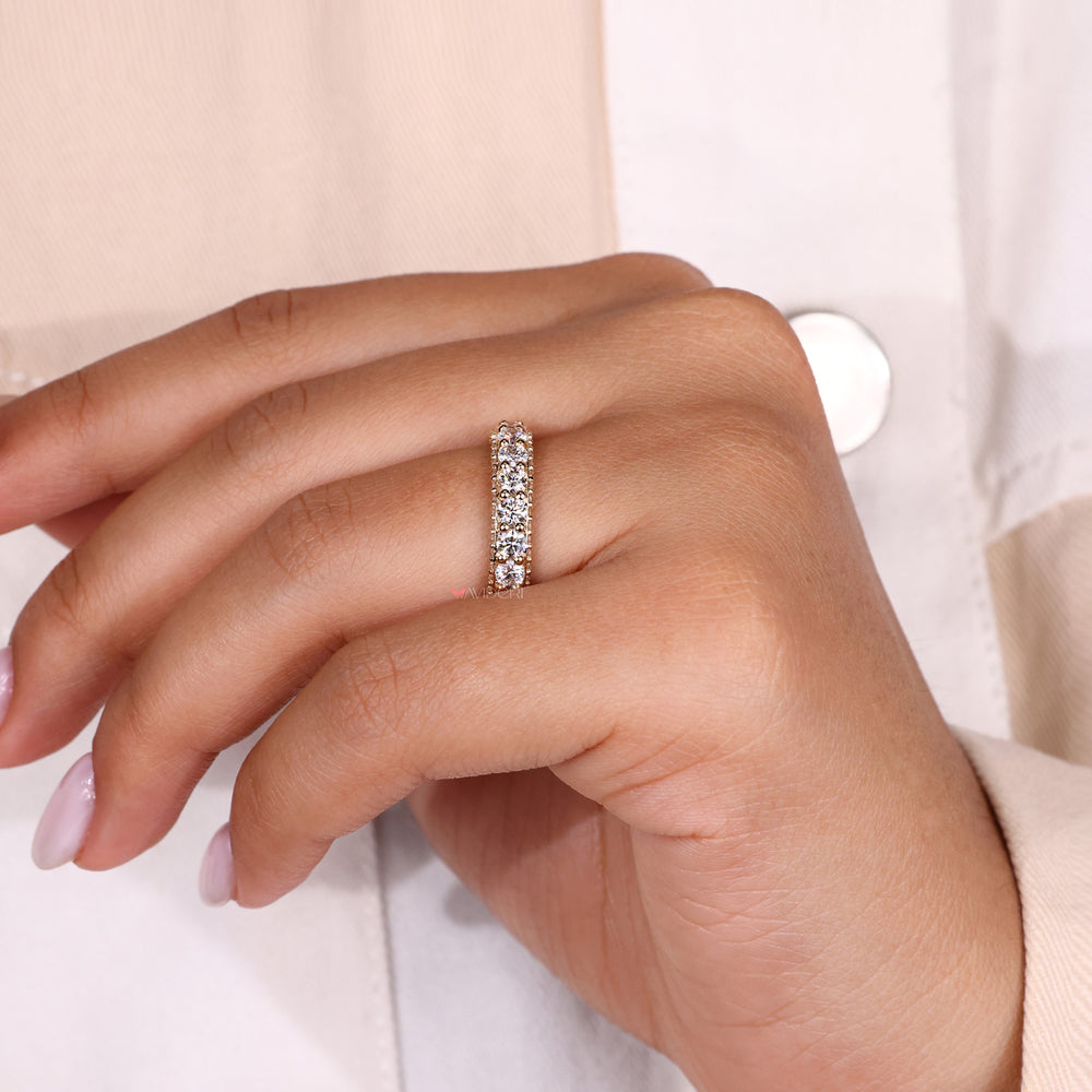 Avideri engagement band featuring a yellow gold eternity setting.

