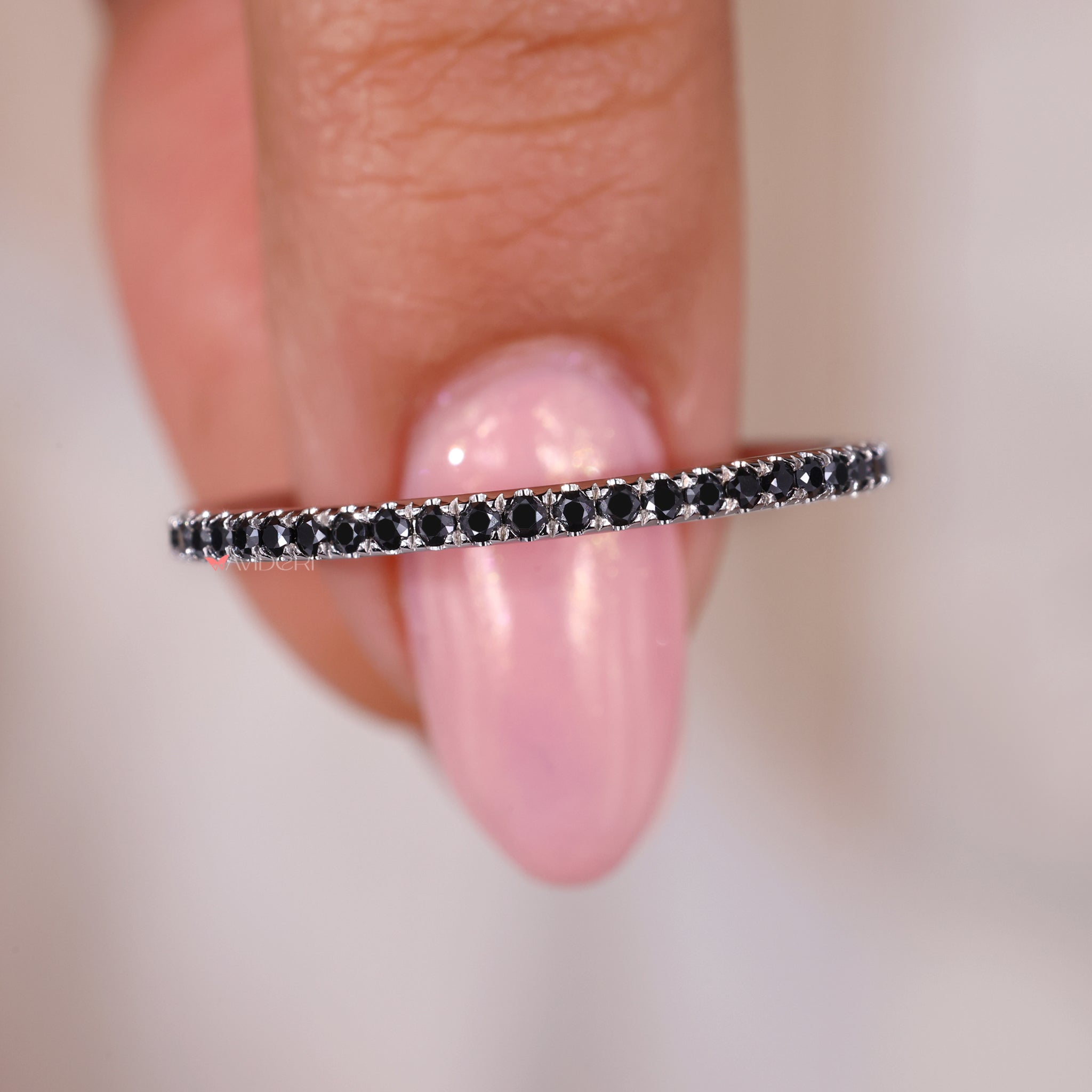 White gold wedding band featuring a stunning round eternity band.