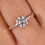 Round diamond engagement ring in yellow gold.
