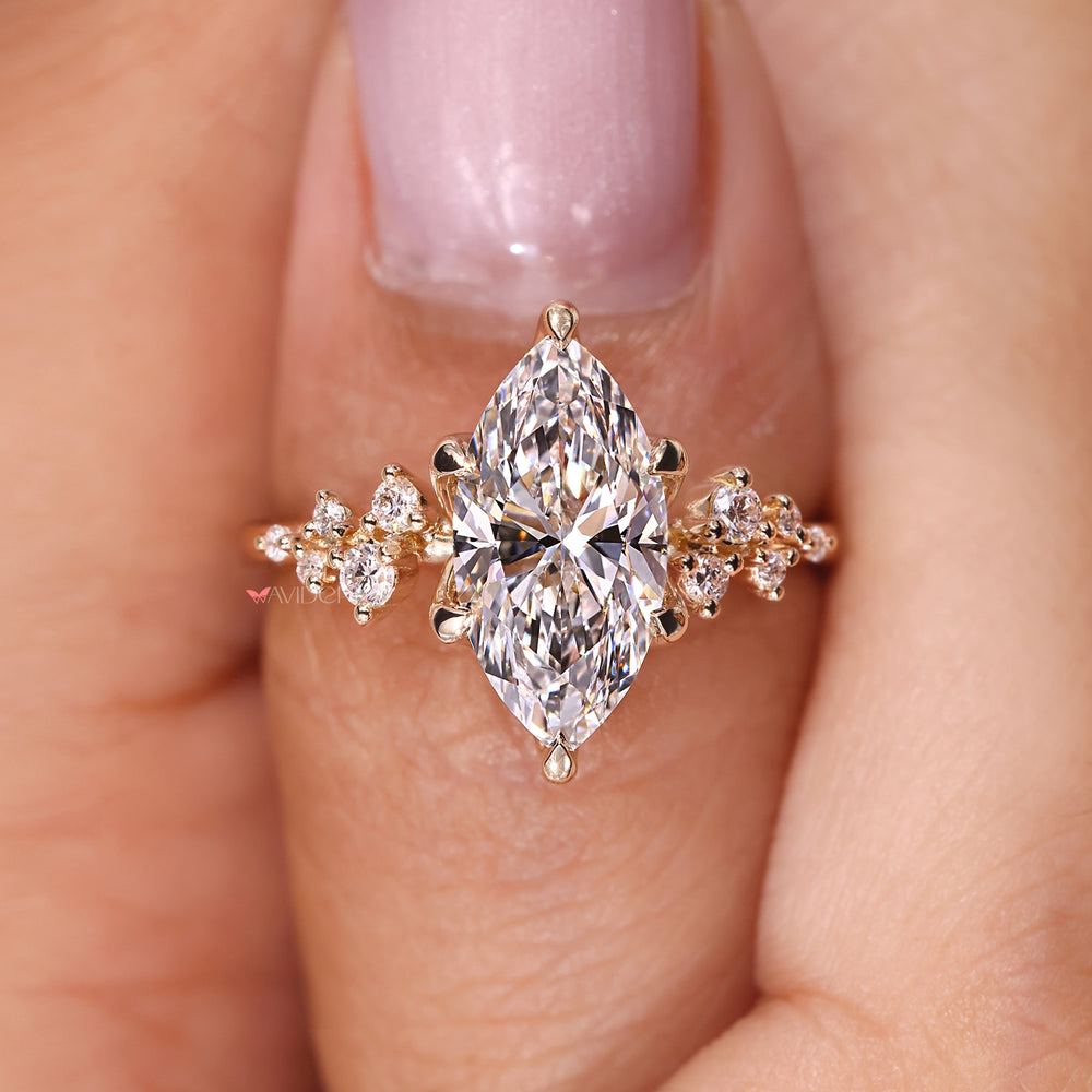 Custom engagement ring featuring a marquise diamond, tailored to fit her style perfectly.