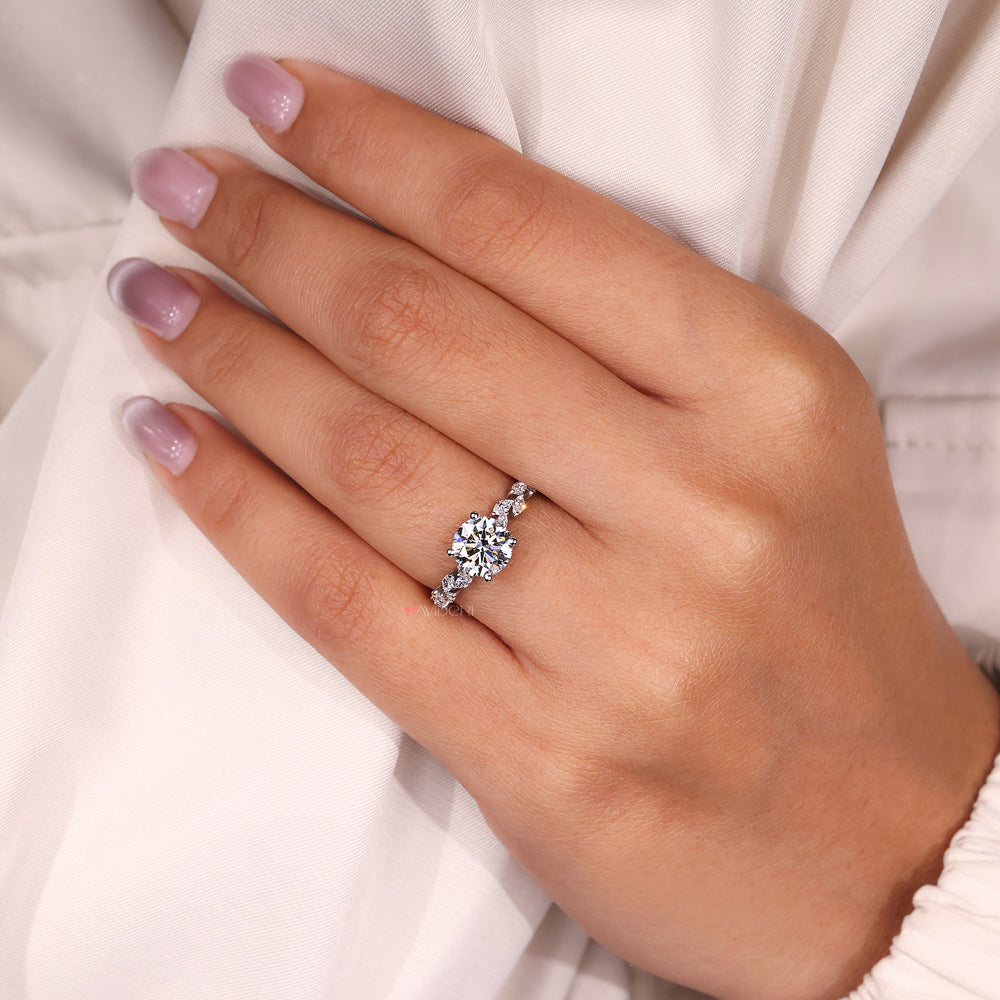A marquise diamond ring in a white gold setting, showcasing an eye-catching design.