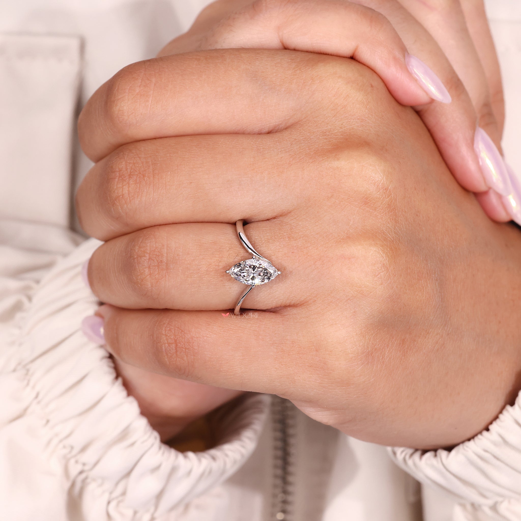 Handmade jewelry includes this unique engagement ring.