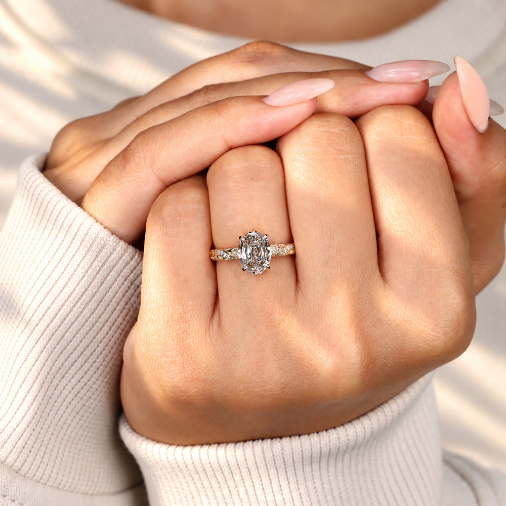 Handmade nature inspired engagement ring with oval diamond
