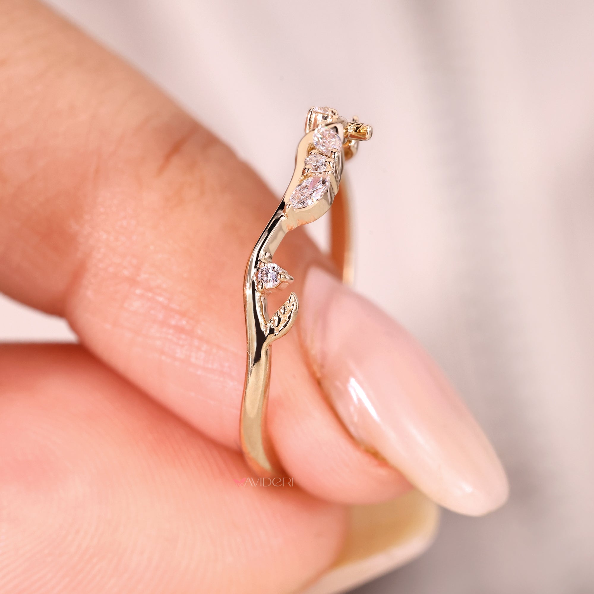Handmade nature inspired wedding band with diamond cluster.