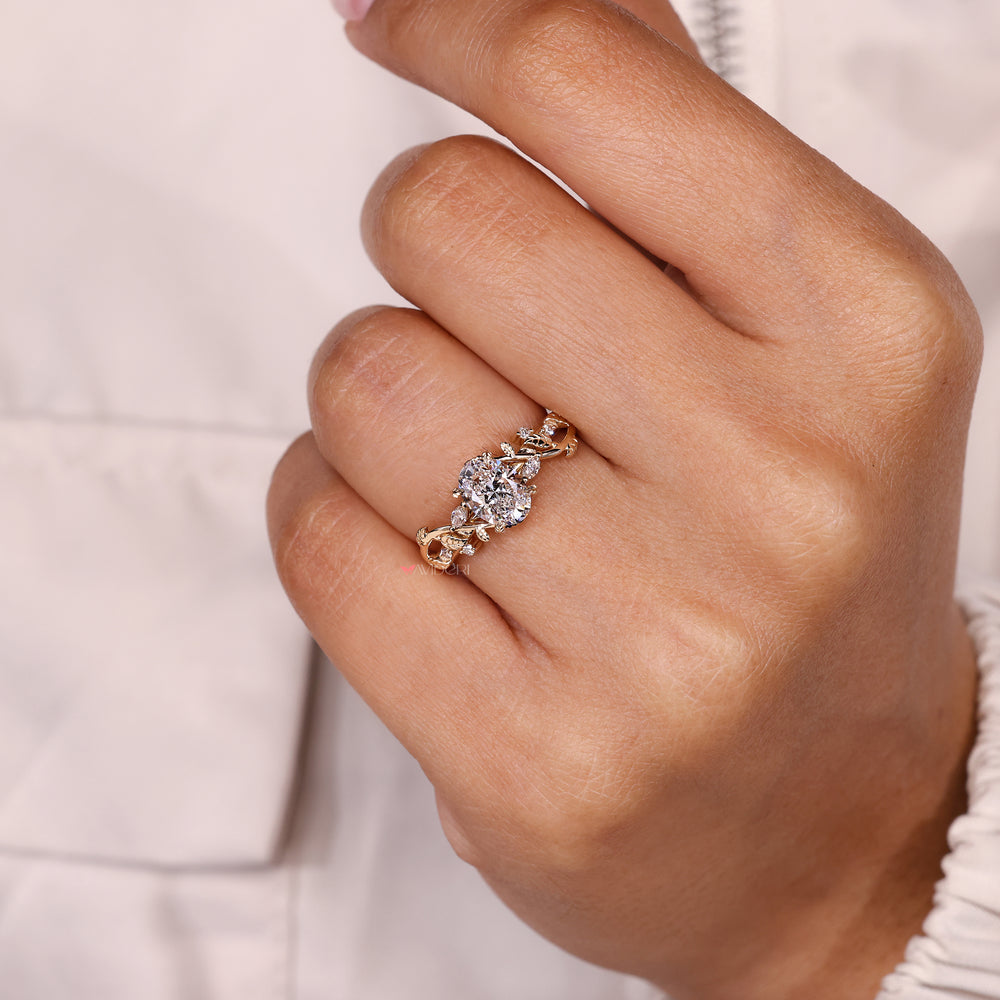 Lab grown diamond oval ring with side stones.
