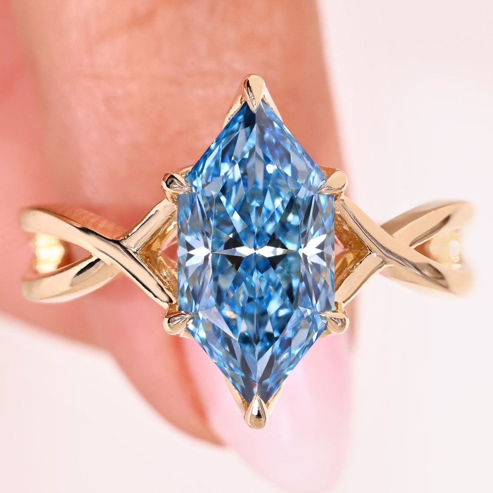 Dutch marquise diamond ring with blue diamond.
