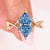 Dutch marquise diamond ring with blue diamond.