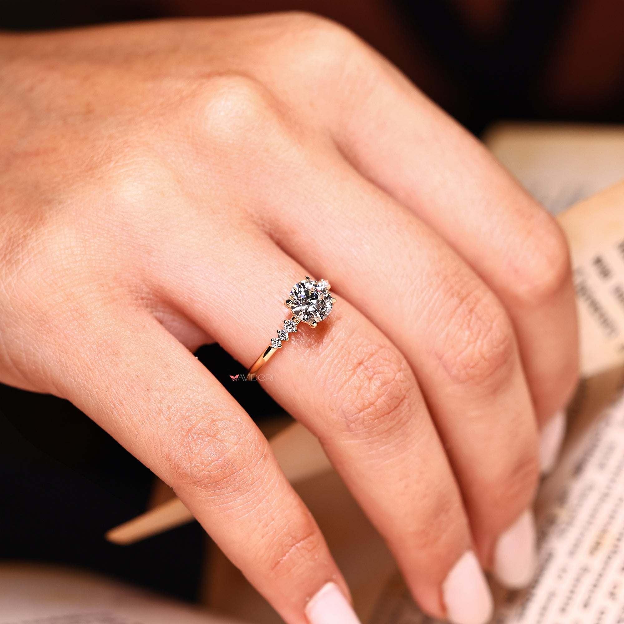 Handmade seven diamond ring with prong setting.