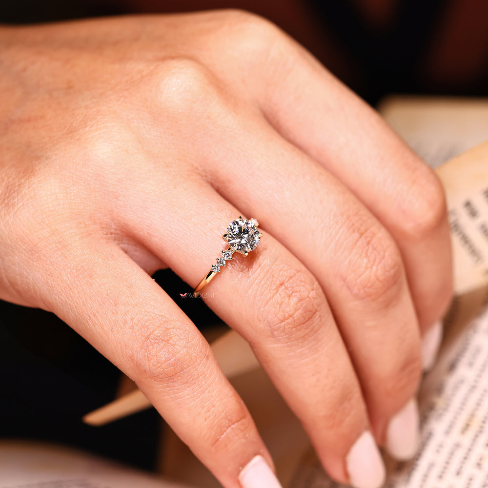 Handmade seven diamond ring with prong setting.