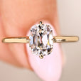 Cushion OEC diamond ring with hidden halo and open gallery
