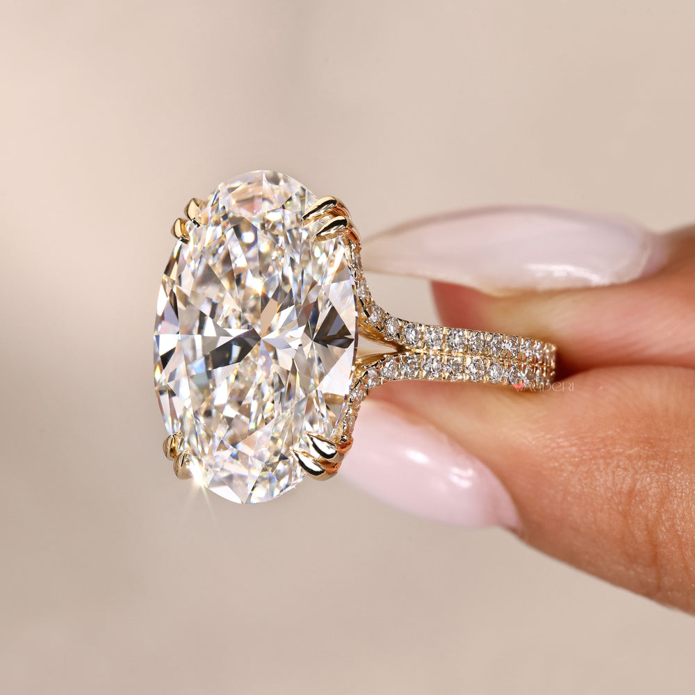 Oval ring with double claw prong setting.
