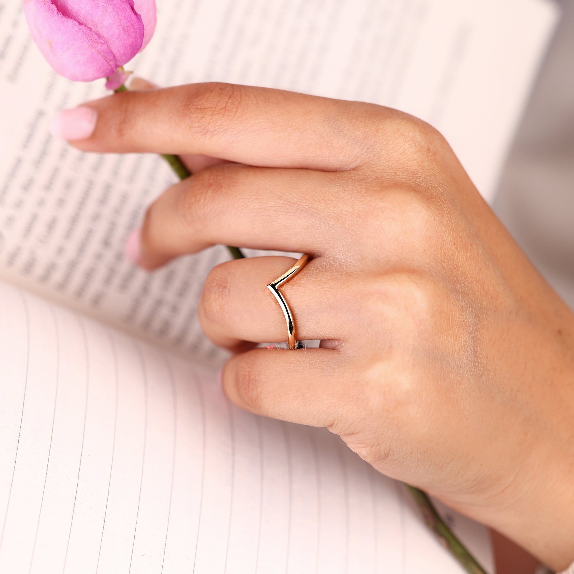 V shaped chevron wedding band with curvy design.