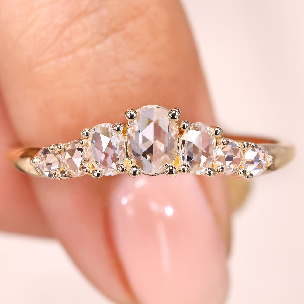 Half eternity band with oval rose cut diamonds.
