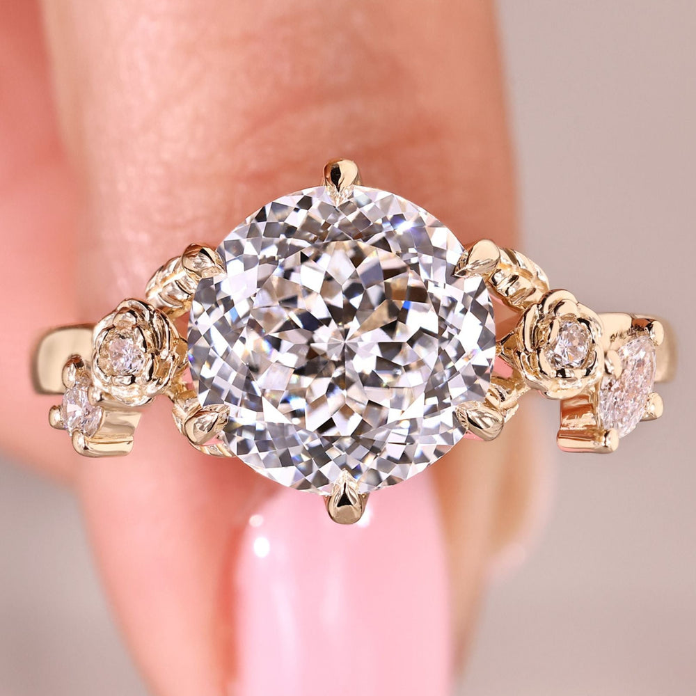 Handmade nature inspired diamond ring featuring Portuguese cut center stone
