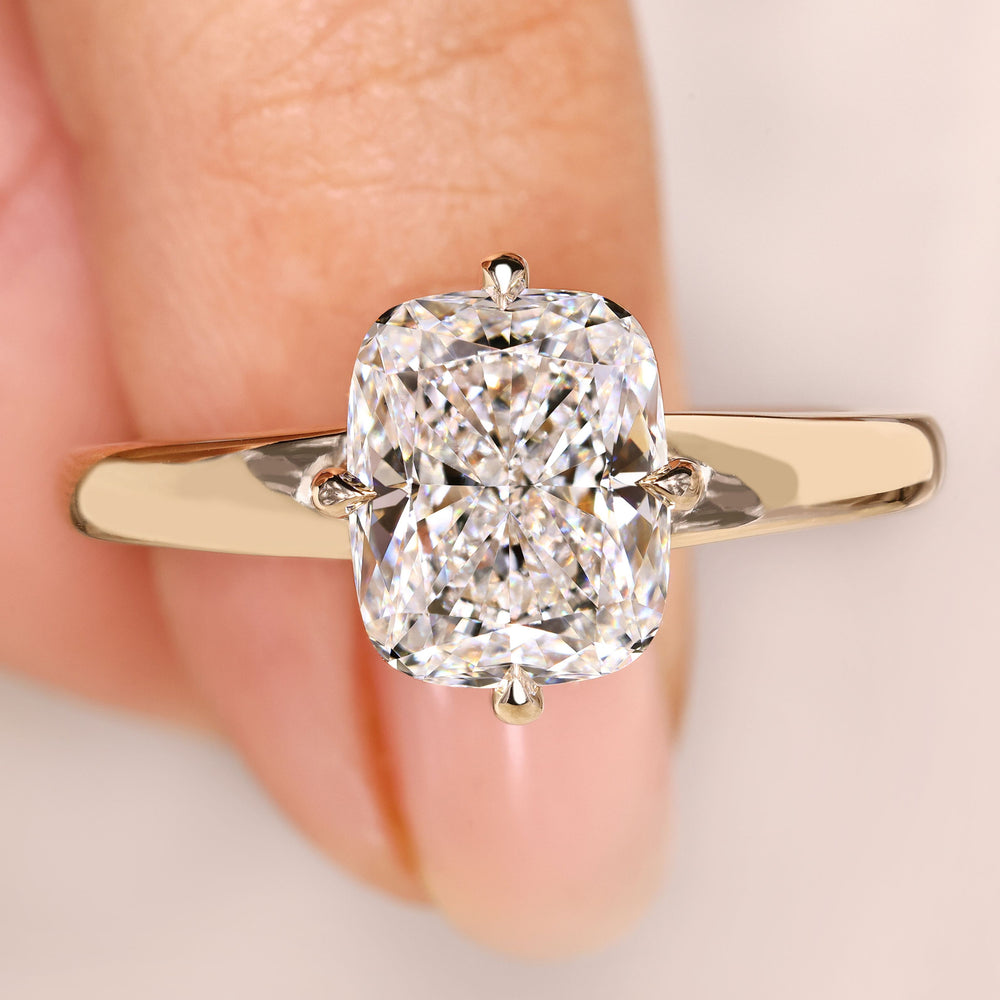 Cushion cut diamond ring solitaire claw prong.
