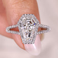 Coffin diamond ring with pave split shank band.
