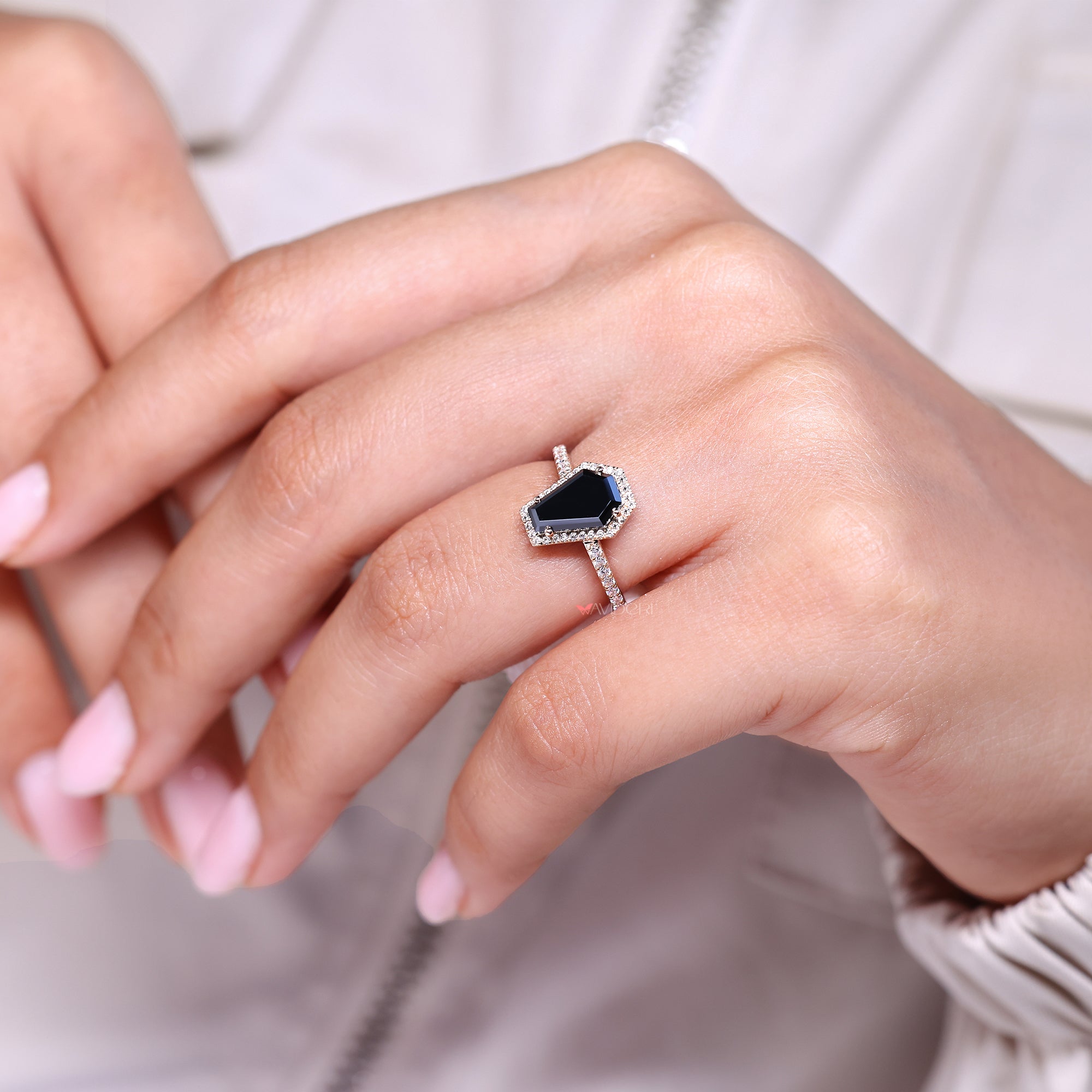 Halo setting ring in pave set engagement ring.