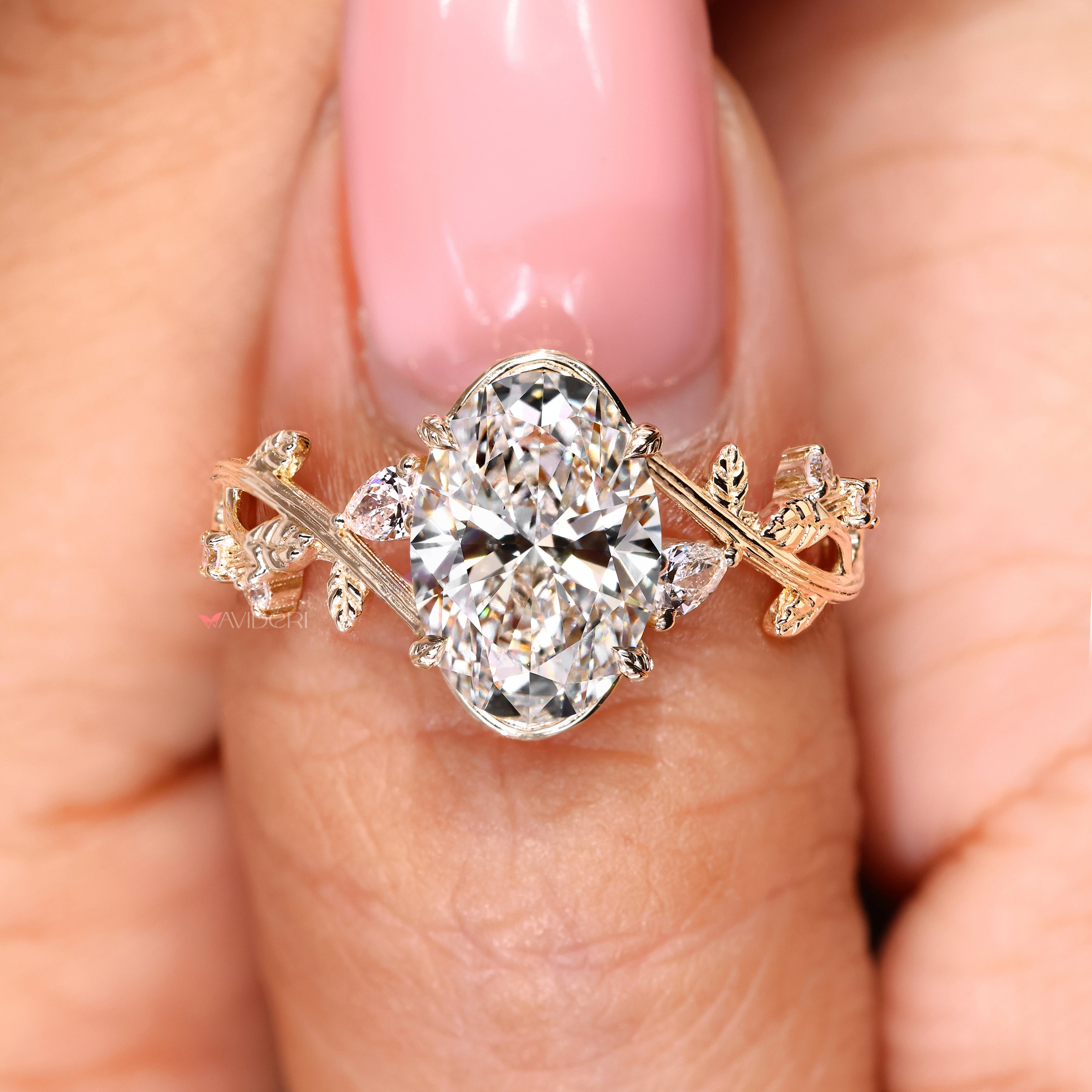 Art deco fairy ring with oval and pear diamonds
